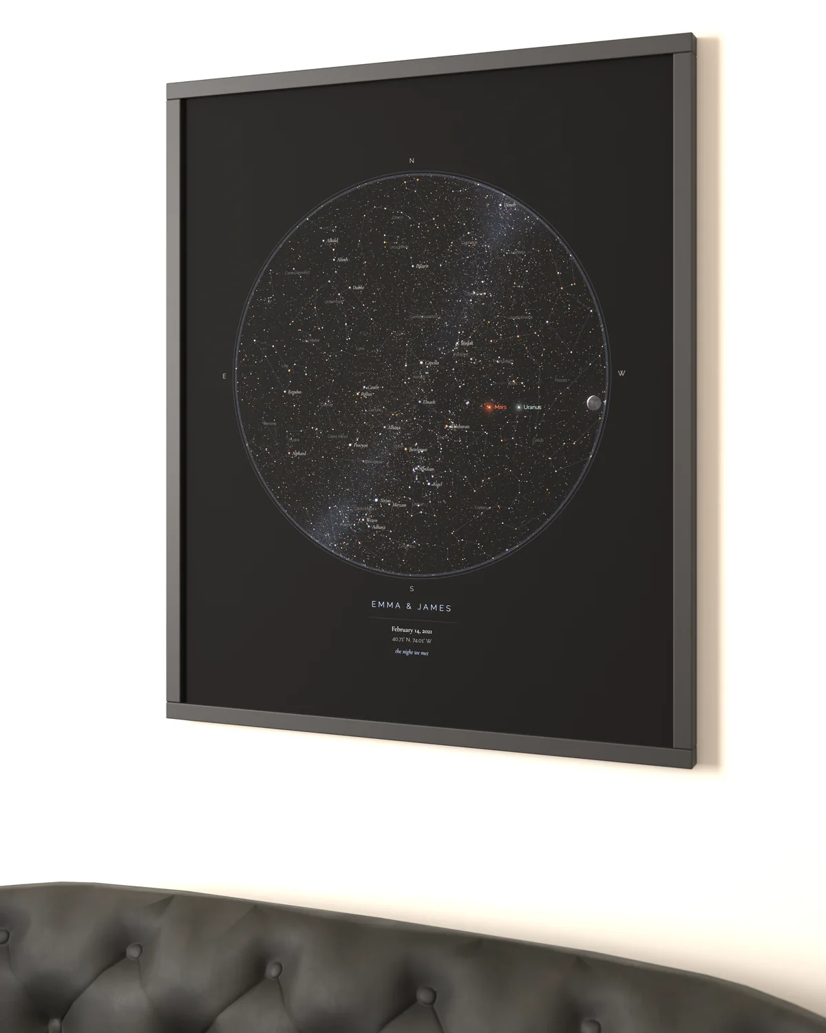 Up close: StarMap print framed in a wall above a sofa